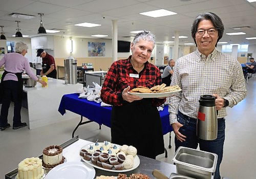Ruth Bonneville / Free Press
VOLUNTEER Oak Table
Photo of Paula Moynihan (left) and John Lu at the Oak Table just prior to the lunch rush on Monday.
Subject: Paula Moynihan and John Lu volunteer with 1JustCity.
Moynihan volunteers her time serving meals at Oak Table, while Lu volunteers his time serving at the Pimicikamak Wellness Centre.
This is for my April 7 volunteers column.
Aaron
March 24th 2025