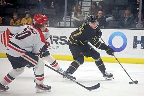 Luke Shipley (27), shown carrying the puck against the Moose Jaw Warriors at Westoba Place in March, set personal offensive highs in every category this season for the Brandon Wheat Kings. (Tim Smith/The Brandon Sun)