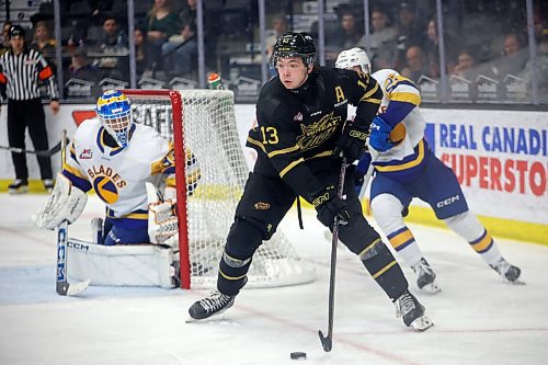 Brandon Wheat Kings Roger McQueen, shown carrying the puck against the Saskatoon following his return to the lineup in March, had four goals in the season opener and just seven the rest of the way through the regular season and playoffs because a back injury seriously limited him. (Tim Smith/The Brandon Sun)