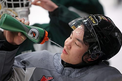 Marcus Nguyen takes a drink during a Brandon Wheat Kings practice at Westoba Place in February. He embraced the new experience of playing with a different team after a trade from the Portland Winterhawks last summer. (Tim Smith/The Brandon Sun)