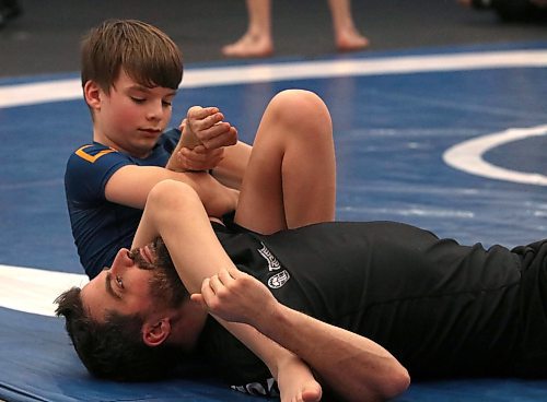 Carwin Craig works on a technique to cinch an armbar as his father Colin watches during a recent jiu-jitsu class at the WAMMA dojo on Park Avenue East. The sport has become a passion for the father and son, who will both participate in an upcoming show in Brandon. (Perry Bergson/The Brandon Sun)
April 8, 2025