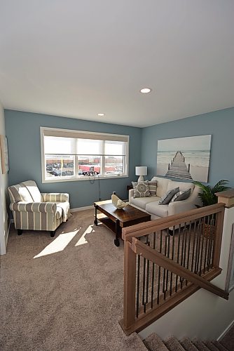 Todd Lewys / Free Press
The roomy and light-filled upper level loft is a perfect hang out spot for kids.