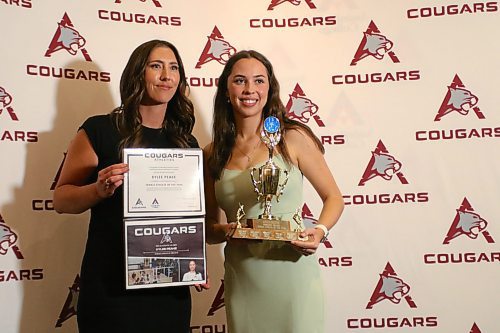 Women's volleyball star Kylee Peake, right, accepted the Assiniboine College female athlete of the year award on Friday from athletics manager Lindsay McLaughlin-Webb. (Thomas Friesen/The Brandon Sun)