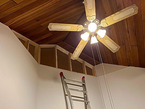 Marc LaBossiere / Free Press
One section at a time, pre-cut drywall was carefully lifted and mounted to the framing.
