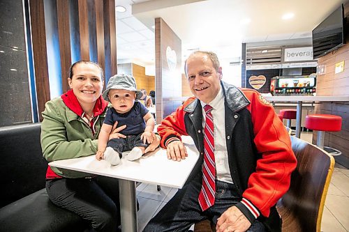 MIKAELA MACKENZIE / FREE PRESS
	

Winnipeg North incumbent MP Kevin Lamoureux, his daughter, MLA Cindy Lamoureux, and her son, 5-month-old Hudson Burns, at the McDonaldճ where both politicians host community meeting hours on Keewatin on Tuesday, April 15, 2025. During this federal election campaign period, the three of them - including the baby - have gone door-knocking on Kevin's behalf together.

For Malak story.
Winnipeg Free Press 2025
