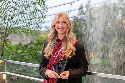 BROOK JONES/FREE PRESS
Hockey player Linnéa Misner, who is a member of the Red River Métis Nation, holds an Indigenous Athlete of the Year award she was presented with during the Manitoba Indigenous Sports and Hall of Fame &amp; Major Awards Ceremony hosted by the MASRC at The Leaf at Assiniboine Park in Winnipeg, Man., Wednesday, April 16, 2025.