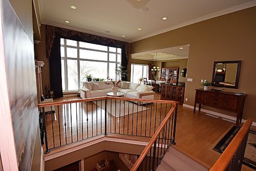 Todd Lewys / Free Press
A pair of huge windows on the home’s rear wall frame the stunning river view while allowing plenty of natural light to flow inside.