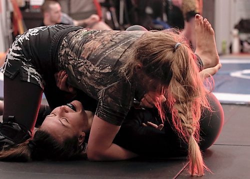 Jillian MacDonald works from the bottom as she looks for a position against her training partner Mika Coles at WAMMA Brandon during a recent training session. (Perry Bergson/The Brandon Sun)
April 26, 2025