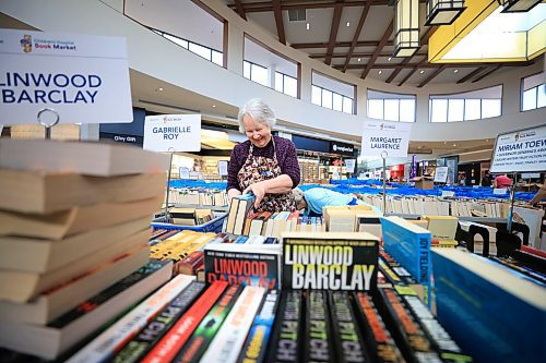 Ruth Bonneville  / Free Press 

ENT - book fair

Photo of  Carol Irving (dark purple) with fellow volunteer - Donna Paul as they assemble books in preparation for the annual book fair at St. Vital Centre Thursday.  

Carol Irving is the Children&#x2019;s Hospital Volunteer Coordinator for the annual Book Market that runs this weekend.  

See story on  (niece of one of the original Book Marketeers from 65 years ago)

Reporter: Conrad Sweatman

April 23rd,  2025
