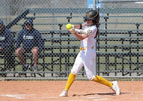 Westman Magic shortstop Logan Rome hits a line drive against the Manitoba Angels on Saturday. (Thomas Friesen/The Brandon Sun)