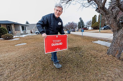 MIKE DEAL / FREE PRESS
Terry Duguid in his riding of Winnipeg South installs a sign while he does some door-knocking, Wednesday afternoon.
Reporter: Malak Abas
250409 - Wednesday, April 09, 2025.