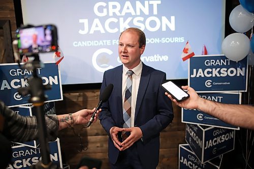 Brandon-Souris Conservative Party of Canada candidate Grant Jackson answers questions from journalists at his campaign party at Joe Beeverz Canadian Pub in Brandon on Monday evening. Jackson won his election race to become the next member of Parliament for Brandon-Souris. (Tim Smith/The Brandon Sun)