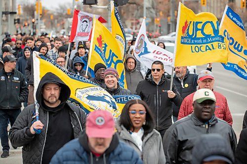 BROOK JONES/FREE PRESS
SAFE Workers of Tomorrow Leader's Walk participants march along Broadway Avenue in Winnipeg, Man., Monday, April 28, 2025. In addtion to the Leaders' Walk, a ceremony to remember Manitobans who died last year after suffering injuries or illness at work took place at the Manitoba Workers Memorial which is also known as the Fallen Firefighter Memorial at Memorial Park in Winnipeg.