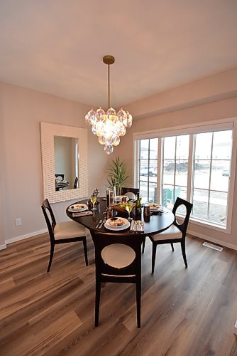 Todd Lewys / Free Press
A huge window behind the spacious dining area lets in lots of natural light &#x2014; and subtly defines it.