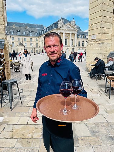 Steve MacNaull / Free Press
Fred the waiter brings us some Pinot Noir at Brasserie Hotel de Ville.