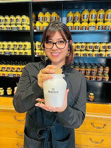 Steve MacNaull / Free Press
Shop clerk Fabia shows off the product at Moutarde Maille.