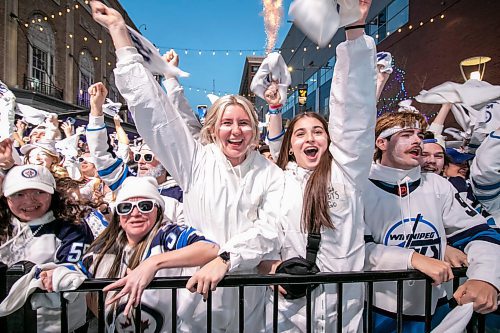BROOK JONES/FREE PRESS
Winnipeg Jets fans Kayla Skoryik and Aliyah Teixeira cheer after the Jets score their team's first goal during Game 5 of the National Hockey League Stanley Cup playoff between the hometown Winnipeg Jets and the visiting St. Louis Blues as she attends the Winnipeg Jets Whiteout party on Donald Street in Winnipeg, Man., Wednesday, April 30, 2025.