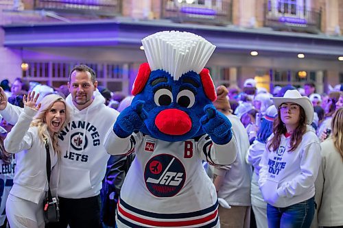 Winnipeg Jets mascot Benny is pictured with Jets fans during the Jets Whiteout street party for Game 5 of the National Hockey League Stanley Cup playoff between the hometown Winnipeg Jets and the visiting St. Louis Blues in Winnipeg, Man., Wednesday, April 30, 2025.