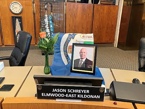 JOYANNE PURSAGA / FREE PRESS
Items were placed at the council chamber desk of late Elmwood-East Kildonan councillor Jason Schreyer before a meeting Friday.