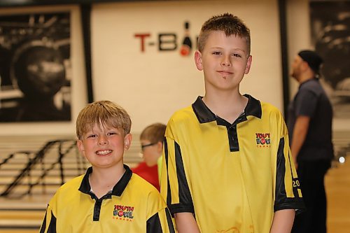 Grant Kehler, left, and Jaxson Lawrence, shown at Thunderbird Bowl earlier this week, are headed to the Youth Bowling Canada national championships in Edmonton next week after a dominant performance at provincials. They compete in bantam doubles. (Perry Bergson/The Brandon Sun)