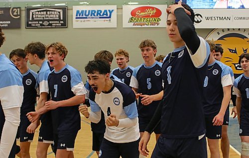 Tournament all-star Kingston Thomas, centre, and the Brandon Volleyball Club 18U boys won their second straight provincial title at the HLC on Sunday. (Thomas Friesen/The Brandon Sun)