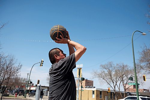 02052025
Conrad Bone takes a shot on net while shooting hoops with friends in front of the Brandon YMCA on Princess Avenue in Brandon on a hot Monday afternoon. . (Tim Smith/The Brandon Sun)