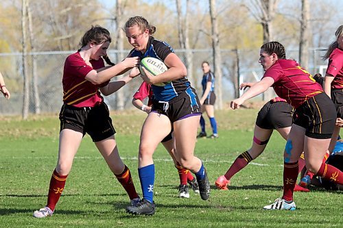 Souris Sabres No. 8 Karas Munz scored five tries in a 68-7 win over the Crocus Plainsmen in Westman High School Rugby girls' action at Crocus on Wednesday. (Thomas Friesen/The Brandon Sun)