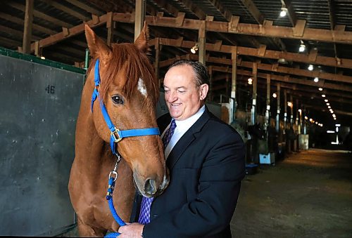 Ruth Bonneville  / Free Press 

Sports  Assiniboia Downs Opening 

Photo of Assiniboia Downs CEO Darren Dunn with horse Magic Tiger at Assiniboia Downs Backstretch Friday.

Story: Opening of Assiniboia Downs Live Race Meeting


May 09,  2025

 