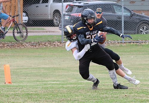 Team Black running back Sully Fox of Dauphin (75) is tackled a moment too late by Team White defensive back Jamie Dandeneau of Interlake (11) as he scores a touchdown during the Rural Manitoba Football League all-star game at Neelin on Sunday afternoon. Team Black won 50-30.(Perry Bergson/The Brandon Sun)
May 12, 2025