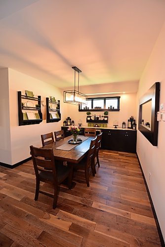 Todd Lewys / Free Press
Set apart from the kitchen yet easily accessible, the formal dining room, which features a handy sideboard on its rear wall, is an entertainer’s delight.