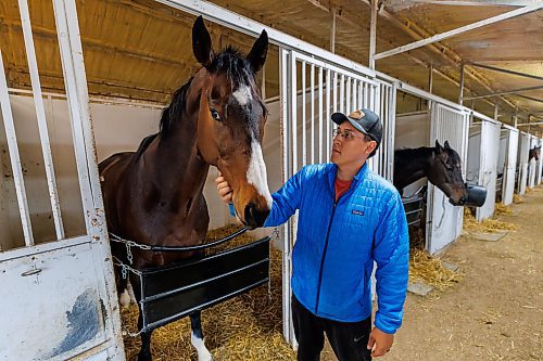 MIKE DEAL / FREE PRESS
The leading trainer at Assiniboia Downs, Steve Keplin, Jr. with horse, Exacting, Friday morning.
Reporter: George Williams
250516 - Friday, May 16, 2025.