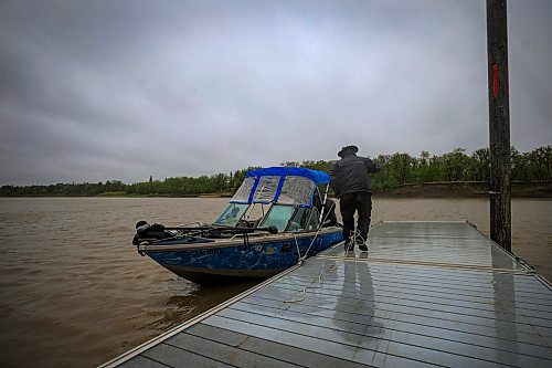 Ruth Bonneville / Free Press
Standup Gone fishin
Photo of fisherman Ron Pratt docking after an afternoon of fishing with a friend at St. Vital Park on Friday.
Avid fisherman Ron Pratt didn’t let the cold, wet and windy temperatures stop him and a friend from spending the afternoon fishing in the Red River near St. Vital Park on Friday.
Despite the bad weather they still caught a few bullheads and channel Catfish which they through back. Pratt runs a group called Fishing Friends Manitoba which enables people of all ages and skill levels the opportunity to get out fishing.
May 16th, 2025