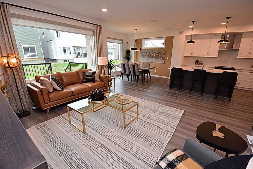 Todd Lewys / Free Press
Huge windows behind the great room and dining area allow loads of natural light to flow freely into the main living area.
