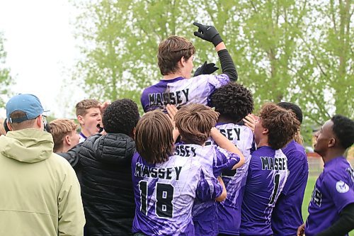 Calen Sass is lifted by his teammates after scoring a hat trick for the Vikings in the final. (Matt Packwood/The Brandon Sun)