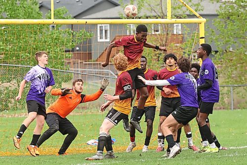21052025
Joshua Ajeigbe #16 of the Crocus Plainsmen heads the ball in front of the Vincent Massey Vikings goal during the high school boys soccer final at Crocus Plains Regional Secondary School on Wednesday.
(Tim Smith/The Brandon Sun)
