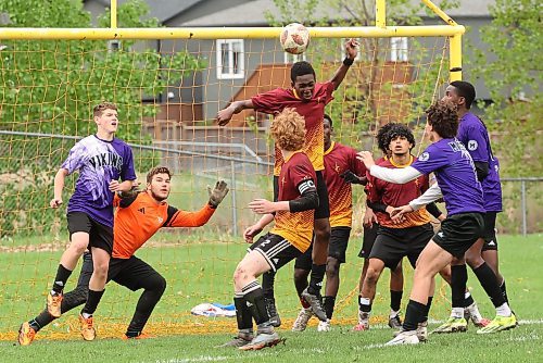 21052025
Joshua Ajeigbe #16 of the Crocus Plainsmen heads the ball in front of the Vincent Massey Vikings goal during the high school boys soccer final at Crocus Plains Regional Secondary School on Wednesday.
(Tim Smith/The Brandon Sun)