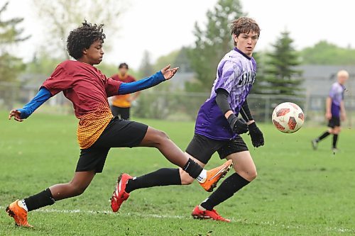 21052025
Zeresenai Hadish #8 of the Crocus Plainsmen moves the ball past Calen Sass #12 of the Vincent Massey Vikings during the high school boys soccer final at Crocus Plains Regional Secondary School on Wednesday.
(Tim Smith/The Brandon Sun)