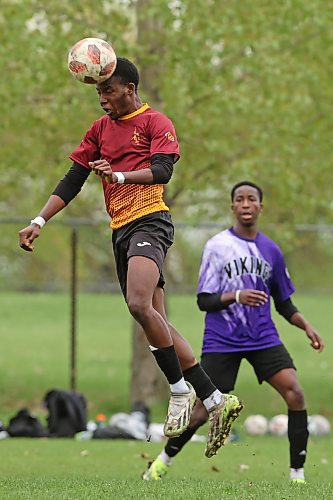 21052025
Ben Ibitoye #15 of the Crocus Plainsmen heads the ball during the high school boys soccer final against the Vincent Massey Vikings at Crocus Plains Regional Secondary School on Wednesday.
(Tim Smith/The Brandon Sun)
