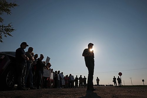 Paul Adriaansen, a farmer from the Carberry area, speaks during Thursday's rally. (Tim Smith/The Brandon Sun)