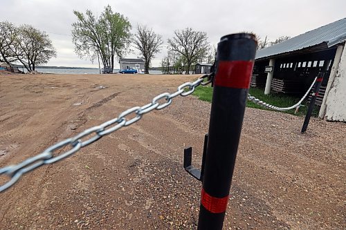 Chained gates stand in Ninette outside the boat launch onto Pelican Lake. The gates were installed at all launches around the lake by the RM of Prairie Lakes as part of a plan to regulate access to the lake. The plan was formed to ensure all boats are inspected for invasive aquatic species before being launched onto Pelican Lake, to keep zebra mussels from spreading to the lake. (Connor McDowell/Brandon Sun)