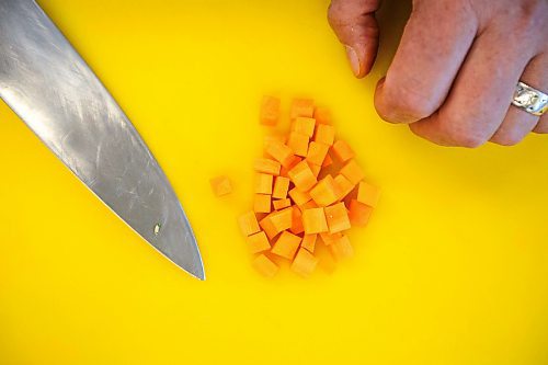 MIKAELA MACKENZIE / FREE PRESS
	

Terry Gereta demonstrates knife skills at RRC Polytech on Monday, May 12, 2025. 

For Eva story.
Winnipeg Free Press 2025