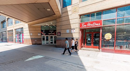 MIKE DEAL / FREE PRESS
The Tim Hortons and Carlton Street at Portage Avenue entrances will be closing.
Visible signs that True North is making progress on the redevelopment of Portage Place Shopping Centre have arrived and soon access to the building will be shifted to allow for the removal of the Clocktower atrium. The main mall area will still be accessible, including access to Prairie Theatre Exchange, but the main access from Portage Avenue will move to the entrance at Portage and Kennedy Street. The entrances at Portage and Edmonton and Portage and Carlton will be closed as well as the skywalk at the Carlton Street intersection. The Parkade entrance and exit on Carlton will be closed. These changes will start in July and continue for three years.
Reporter: Malak Abas
250526 - Monday, May 26, 2025.