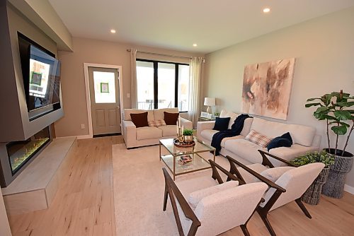 Todd Lewys / Free Press
Naturally bright, spacious and elegantly finished, the great room has a door on its rear wall that leads out to a large, covered backyard deck.