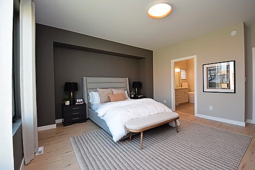 Todd Lewys / Free Press
The spacious and secluded primary bedroom offers a perfect blend of style and natural brightness.