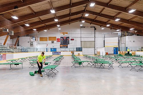 MIKE DEAL / FREE PRESS
Winnipeg Search and Rescue volunteers set up around 100 cots in the Eric Coy Arena, 535 Oakdale Dr, as they assist the Red Cross by setting up facility for them.
Reporter: Tyler Searle
250529 - Thursday, May 29, 2025.
