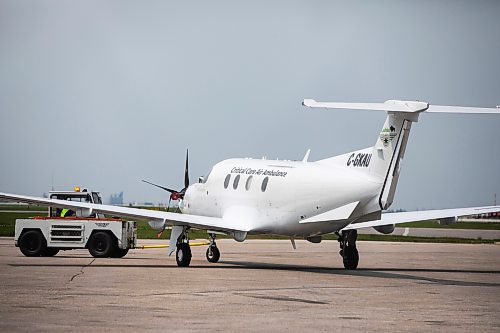 MIKAELA MACKENZIE / FREE PRESS
	
An air ambulance is towed into a hangar after landing in Winnipeg on Thursday, May 29, 2025. 

Winnipeg Free Press 2025