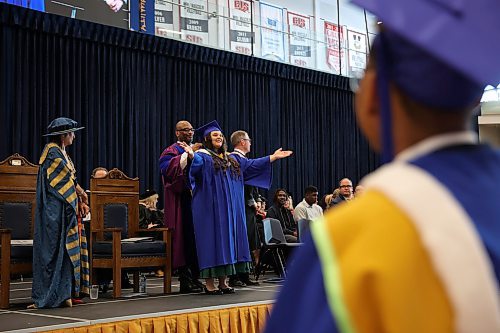 29052025
Aimee Schmidt blows a kiss to supporters in the crowd while receiving a Brandon University silver medal for Computer Science while on stage to receive her diploma during Brandon University’s convocation for the Faculty of Science and the School of Music at the BU Healthy Living Centre on Thursday morning.
(Tim Smith/The Brandon Sun)