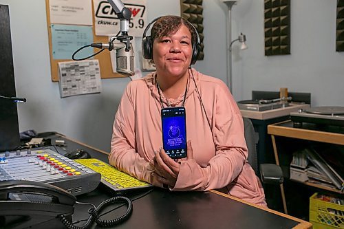 BROOK JONES/FREE PRESS
CKUW's Rez Vibe Connections host Stephanie Kersey, 43, show an image of her show's logo on her cellphone while is pictured inside the radio station's announcer's booth at the University of Winnipeg in Winnipeg, Man., Friday, May 30, 2025. Kersey's show airs live Fridays from 5 to 7 p.m.