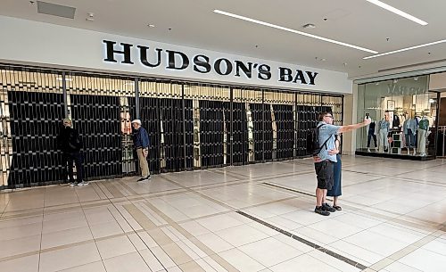 JOHN WOODS / FREE PRESS
The Bay store at St Vital was locked down today Sunday, June 1, 2025 Winnipeg. Some people stopped by to check for last minute deals, take a peek at the empty, or grab a selfie in front of the closed store.
Reporter: aaron