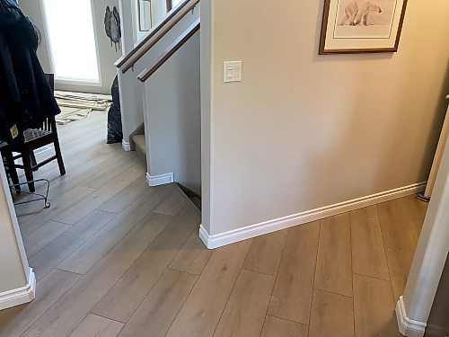 Marc LaBossiere / Free Press 
Once all the baseboards were installed, finishing steps included filling the nail holes, sanding corners and doing paint touch-ups. 